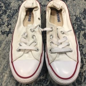 Converse slip on sneakers.